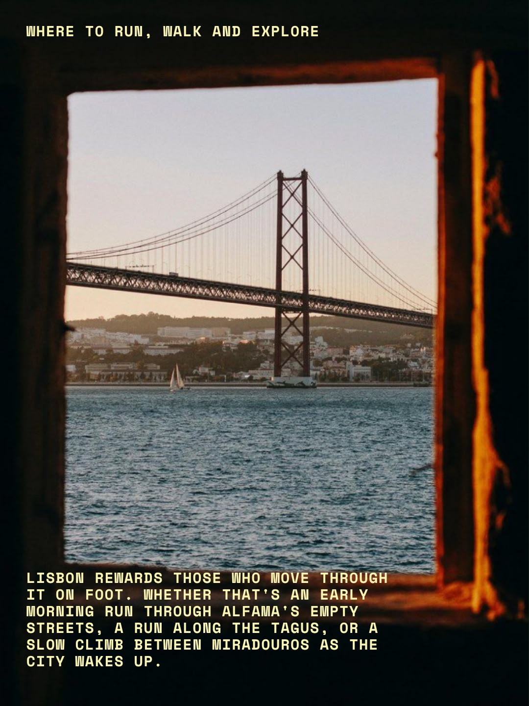 The 25 de Abril bridge over the Tagus, framed through a stone window