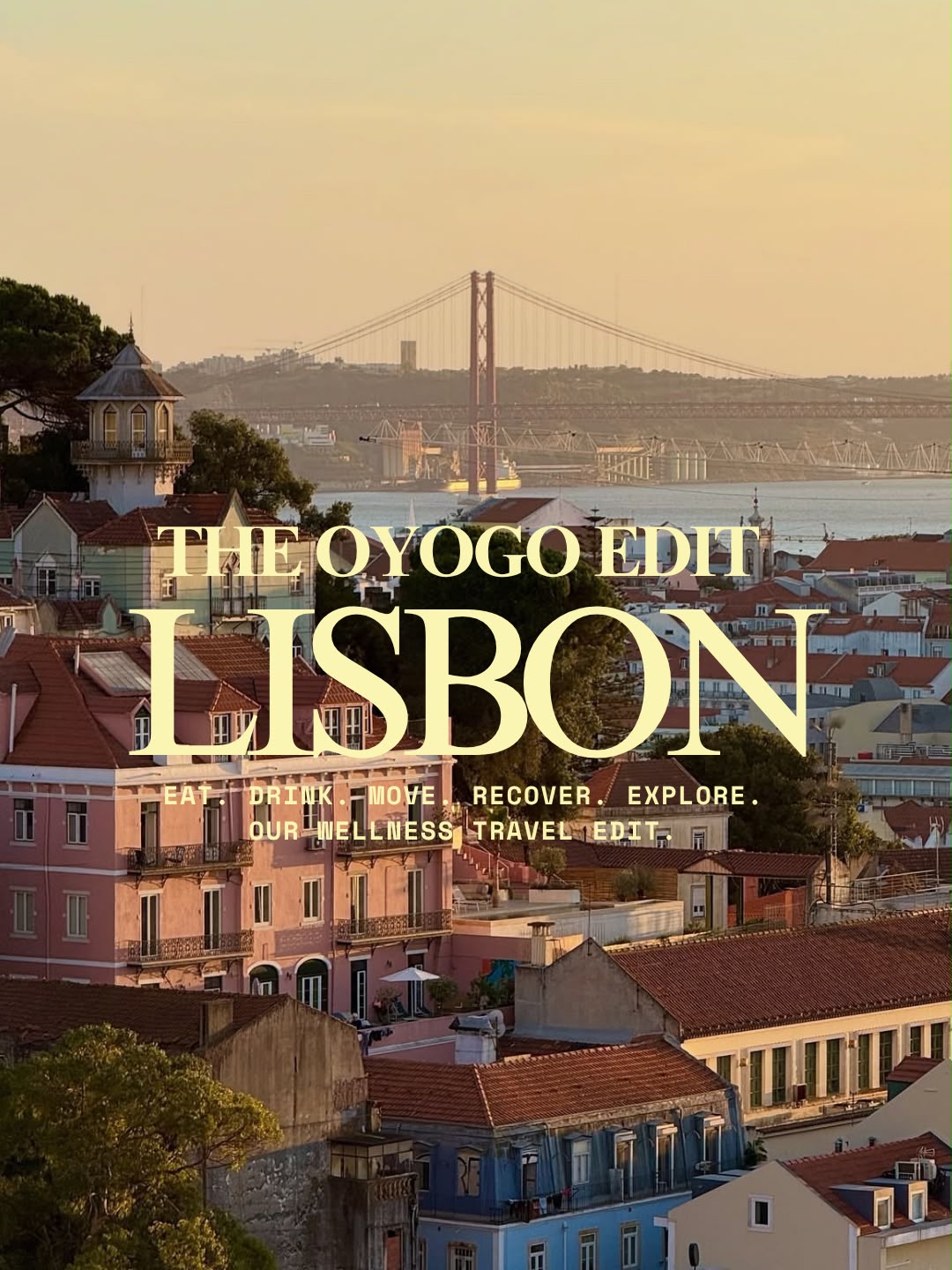 Lisbon rooftops at golden hour with the 25 de Abril bridge beyond