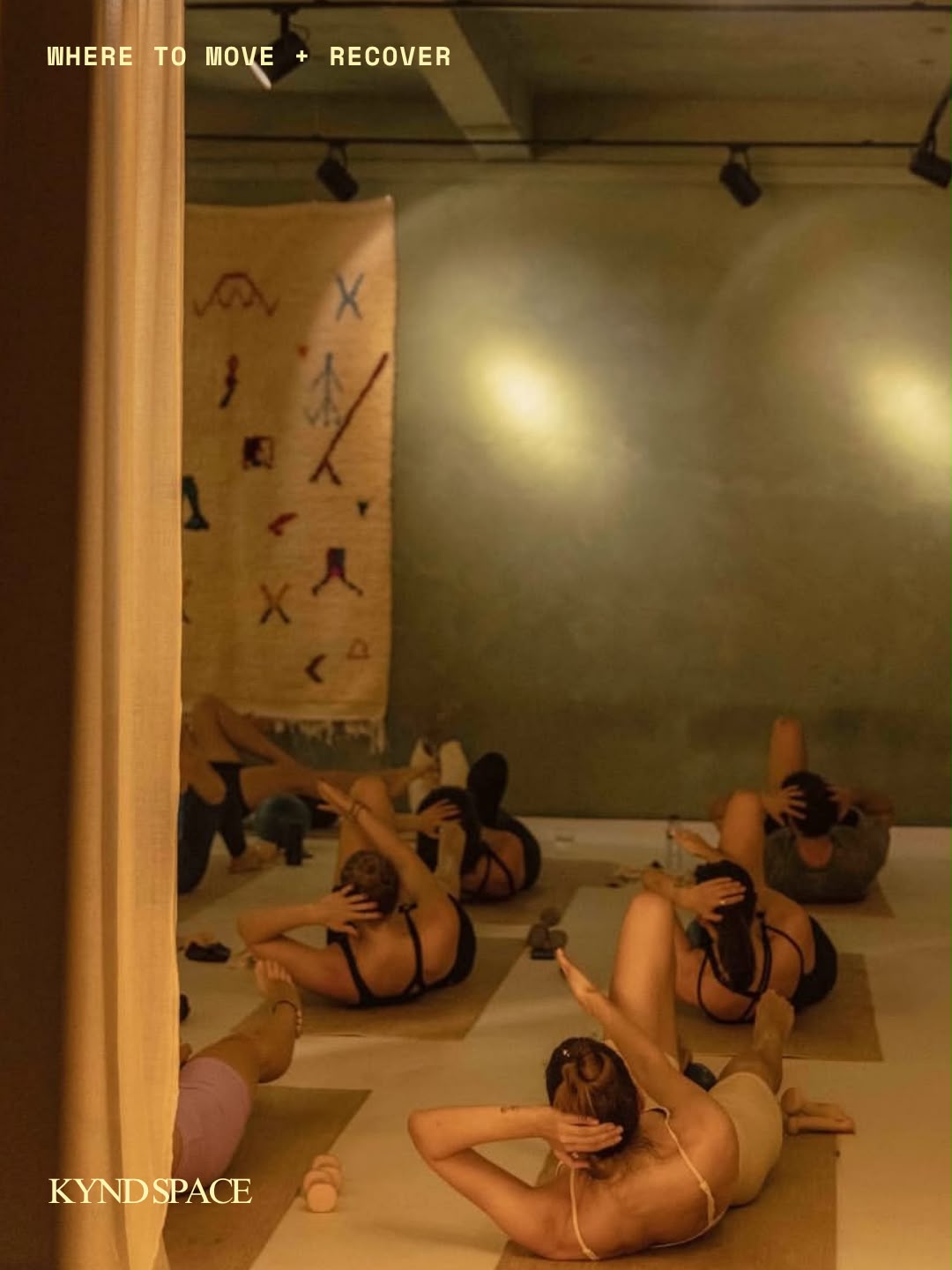 A mat class in warm light at Kynd Space, Lisbon