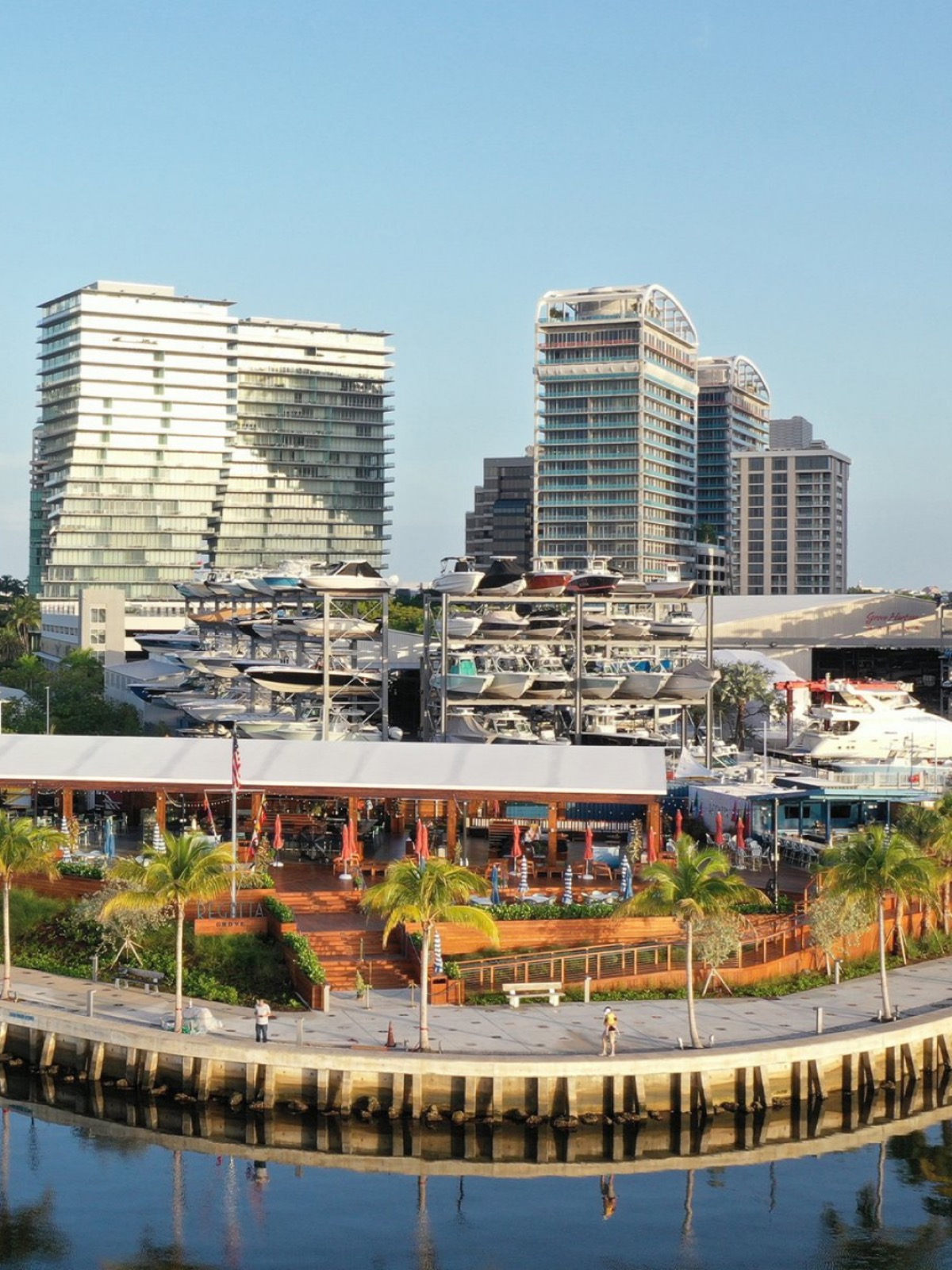 Mature tree canopy and low-rise waterfront in Coconut Grove