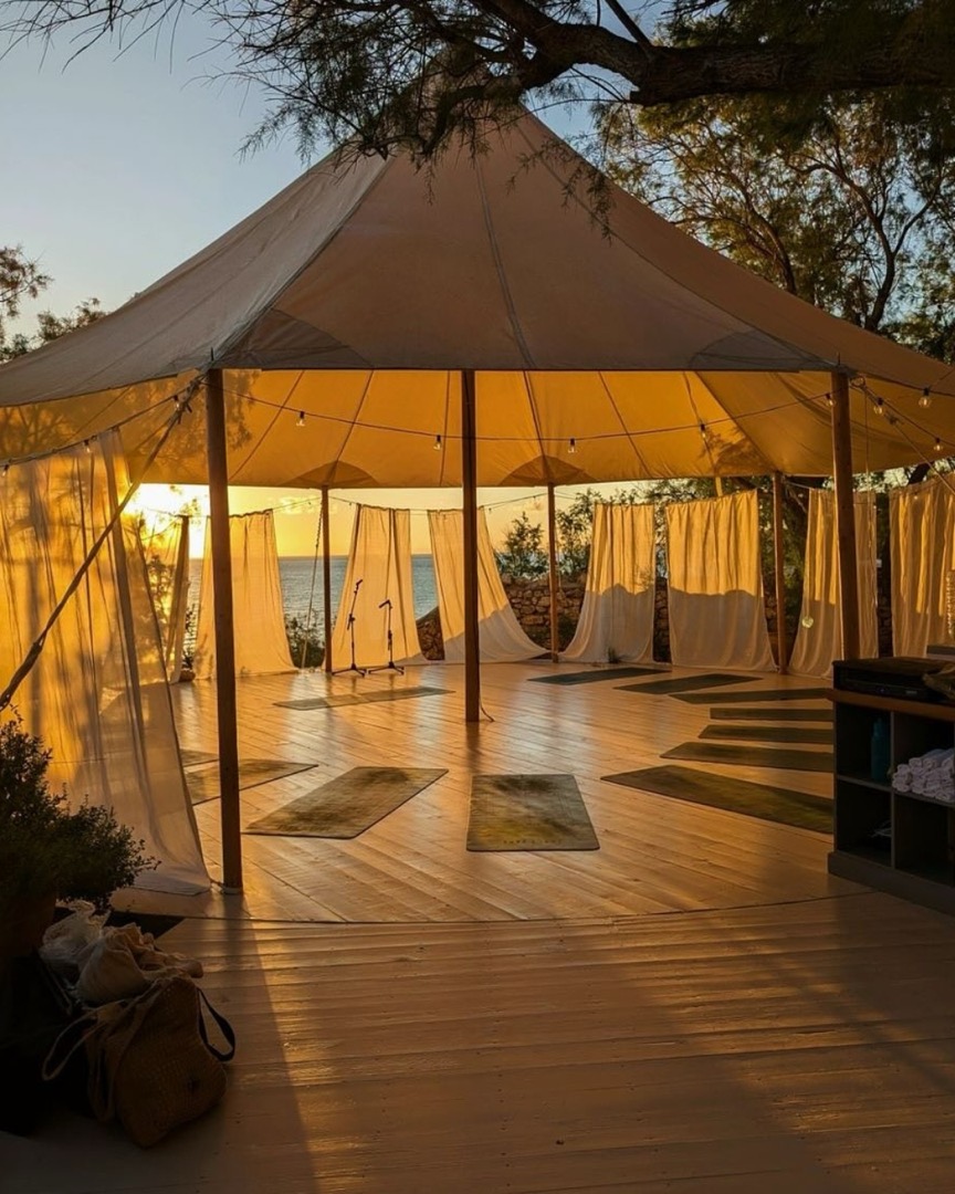 Sunset yoga tent by the sea